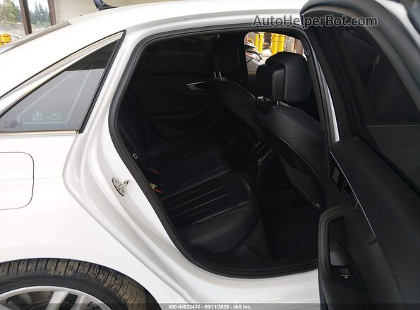 WAUEAAF41NN009302 2022 AUDI A4 White VIN sticker view