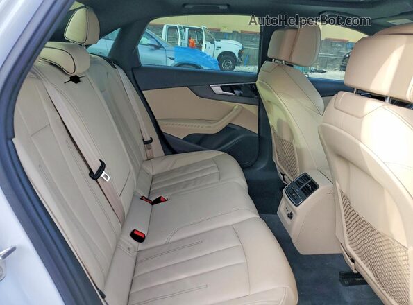 WAUEAAF4XMA016304 2021 AUDI A4 White Vista de los asientos traseros