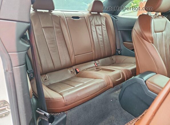WAUTNAF51JA004963 2018 AUDI A5 White Vista de los asientos traseros