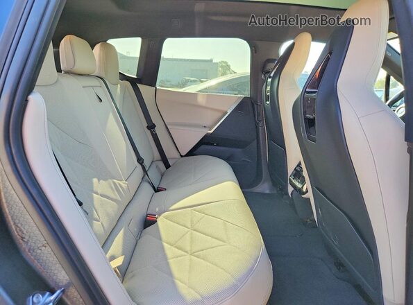 WB523CF00SCT40738 2025 BMW IX White Rear seats view