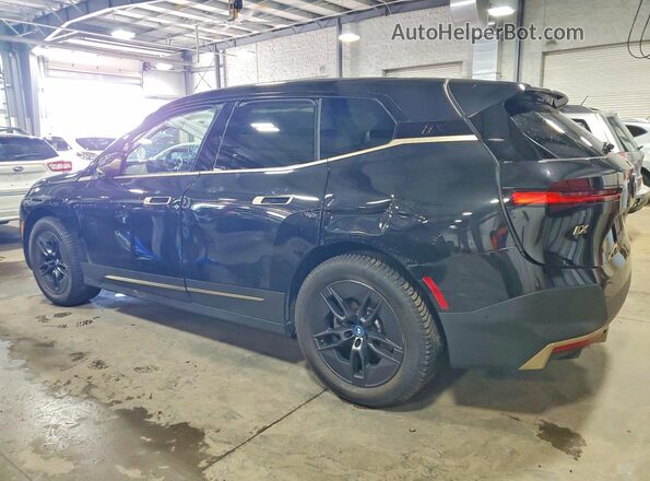 WB523CF02SCU36158 2025 BMW IX Black Tył lewy