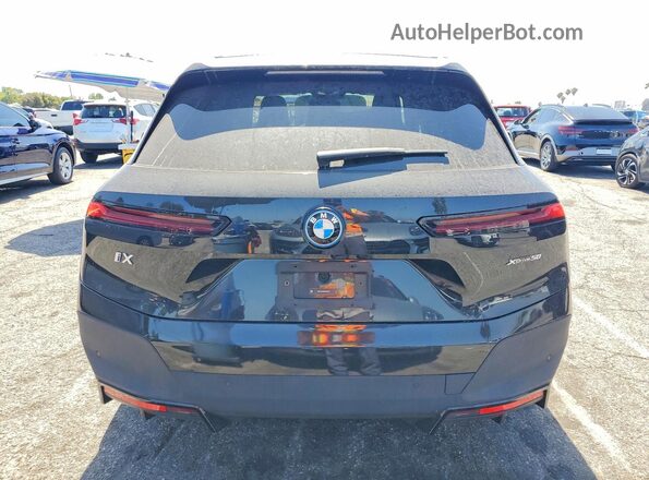 WB523CF03RCR27056 2024 BMW IX Black Հետևի տեսք