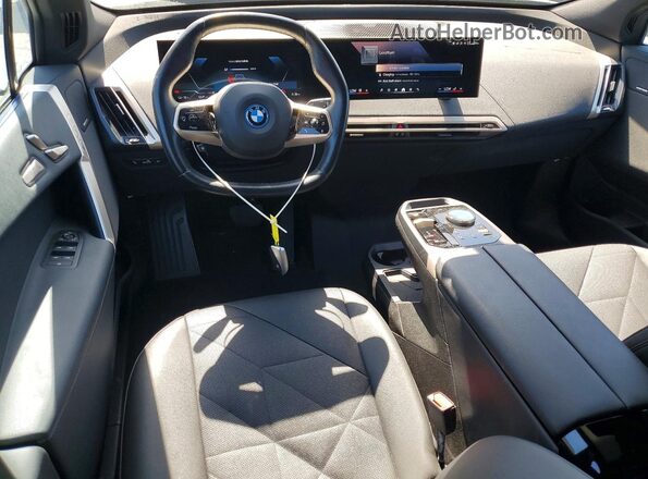 WB523CF03RCR27056 2024 BMW IX Black Առջևի վահանակի տեսք