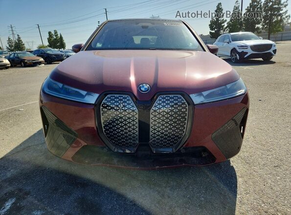 WB523CF03SCS07827 2025 BMW IX Burgundy Вид задньої частини салону