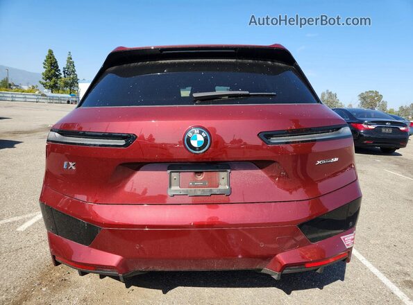 WB523CF03SCS07827 2025 BMW IX Burgundy Вид ззаду