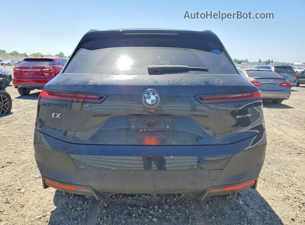 WB523CF04SCT67960 2025 BMW IX Black უკანა ხედი