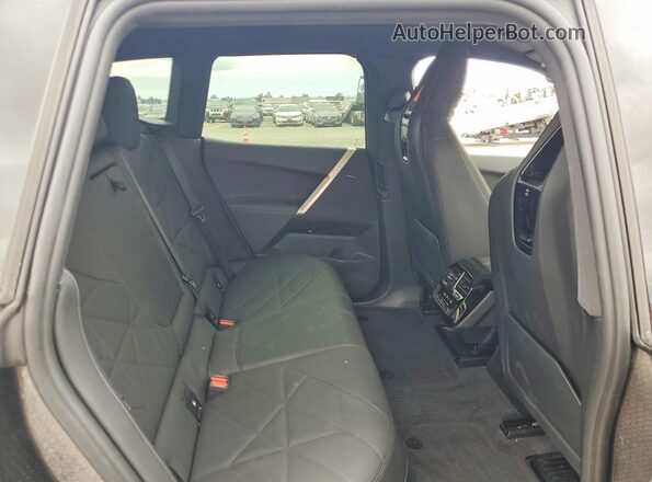 WB523CF04SCT70826 2025 BMW IX Серый Вид задней части салона