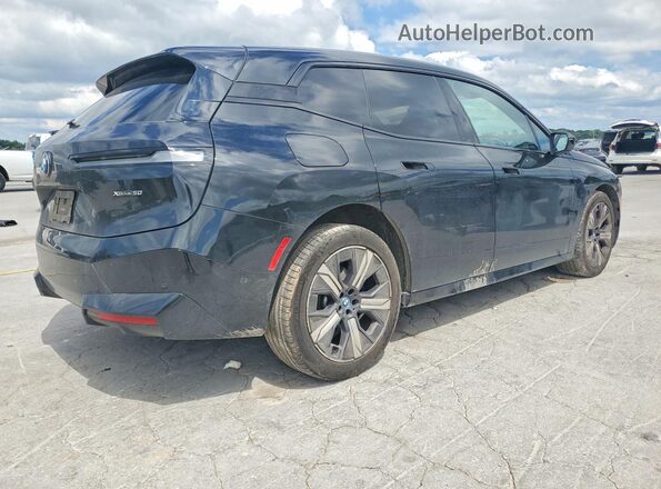 WB523CF05RCR52749 2024 BMW IX Black Rear right