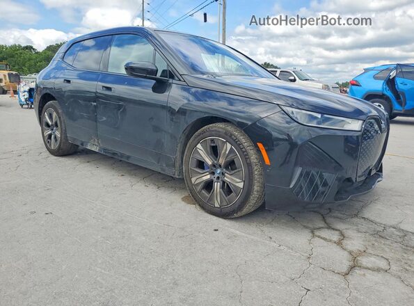 WB523CF05RCR52749 2024 BMW IX Black Front right