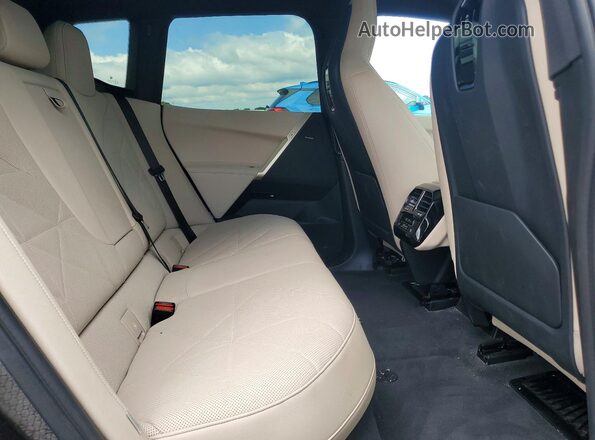 WB523CF05RCR52749 2024 BMW IX Black Rear interior view