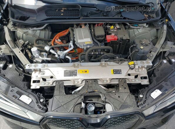 WB523CF05RCR52749 2024 BMW IX Black Engine compartment view