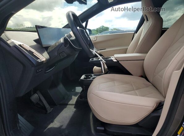 WB523CF05RCR52749 2024 BMW IX Black Front interior view