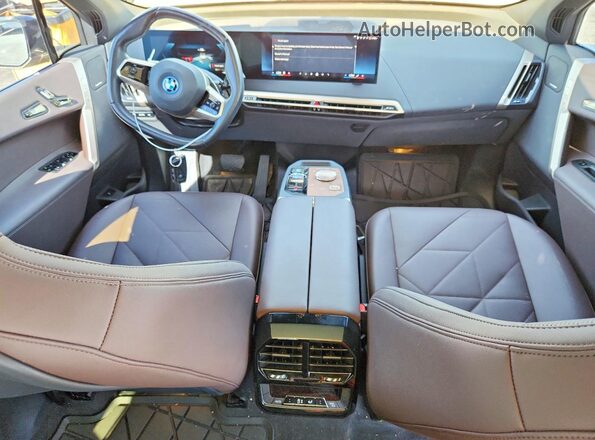 WB523CF06RCN40646 2024 BMW IX Black Вид панелі приладів