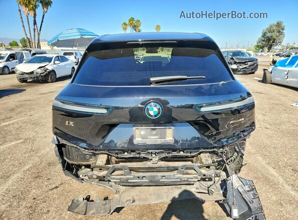 WB523CF06RCN40646 2024 BMW IX Black Вид ззаду