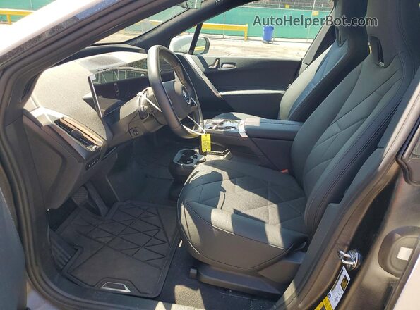 WB523CF06RCP69084 2024 BMW IX White Widok wnętrza z przodu