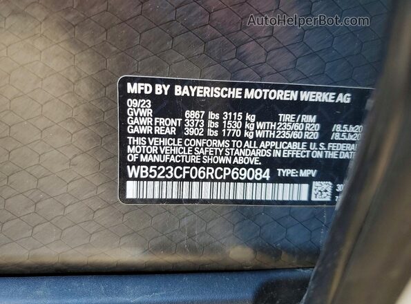 WB523CF06RCP69084 2024 BMW IX White Widok naklejki z numerem VIN