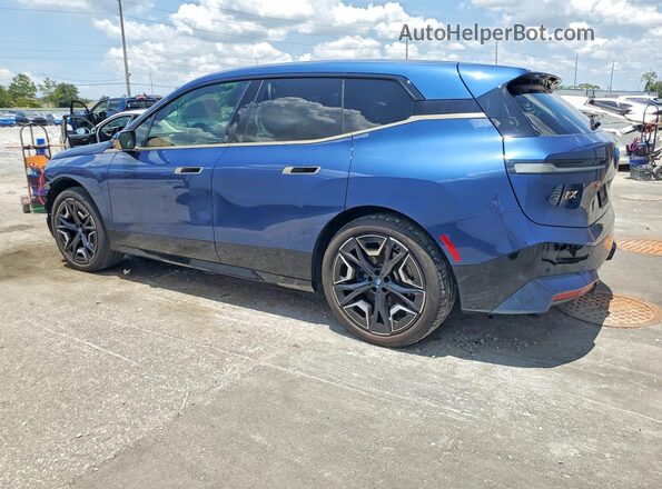 WB523CF06RCR08663 2024 BMW IX Синий Задняя левая четверть