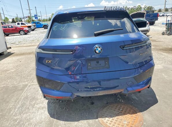 WB523CF06RCR08663 2024 BMW IX Синий Вид сзади