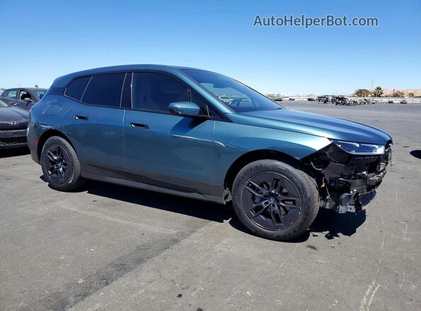 WB523CF07RCR74252 2024 BMW IX Teal Передня права чверть