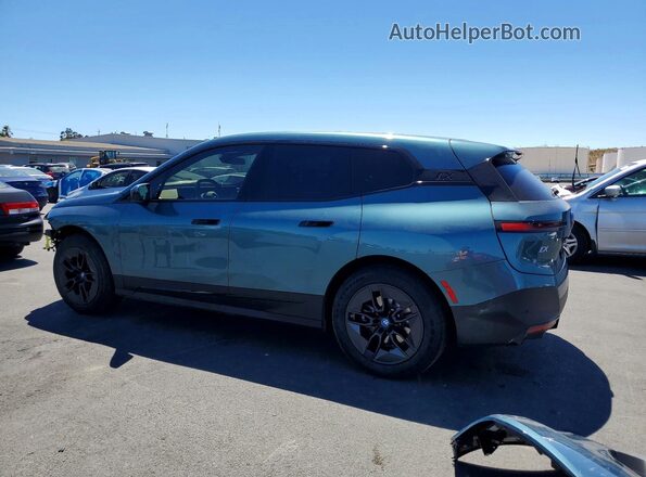 WB523CF07RCR74252 2024 BMW IX Teal Задня ліва чверть