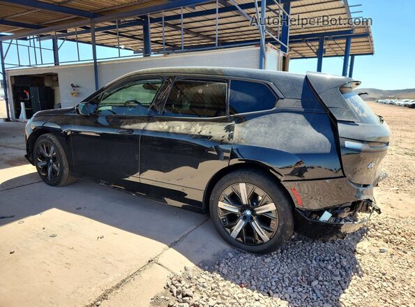 WB523CF07SCT06571 2025 BMW IX Black Հետևի ձախ