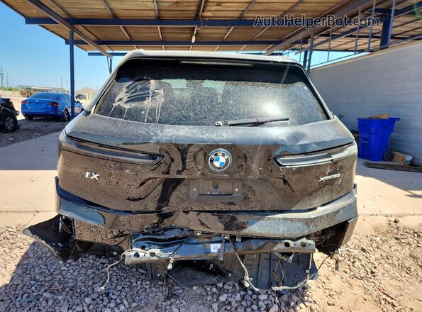 WB523CF07SCT06571 2025 BMW IX Black Հետևի տեսք