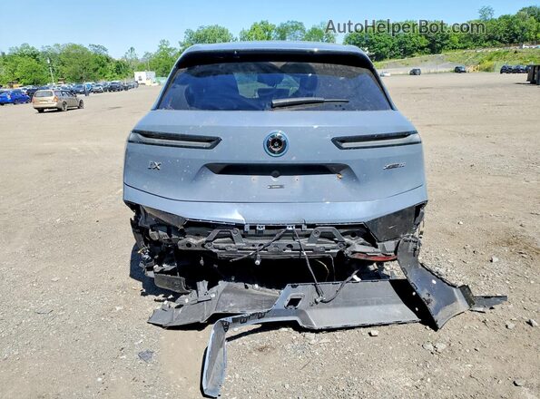 WB523CF08RCP23479 2024 BMW IX Gray Հետևի տեսք