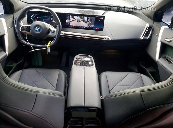 WB523CF08RCP54392 2024 BMW IX Black Вид панелі приладів