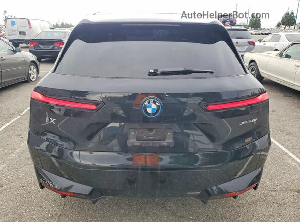 WB523CF08RCP54392 2024 BMW IX Black Вид ззаду