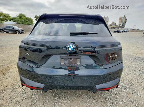 WB523CF0XRCP95512 2024 BMW IX Черный Вид сзади