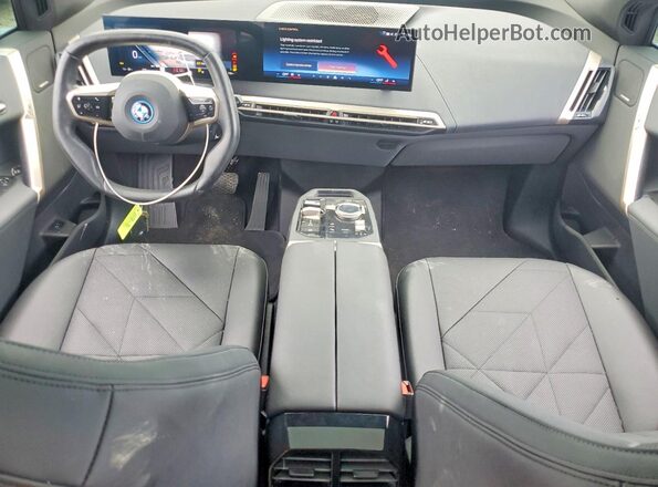 WB523CF0XSCS28531 2025 BMW IX Black Առջևի վահանակի տեսք