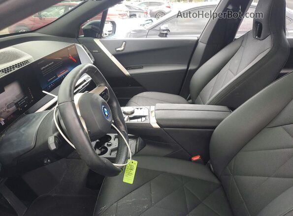 WB523CF0XSCS28531 2025 BMW IX Black Սալոնի դիմացի տեսք