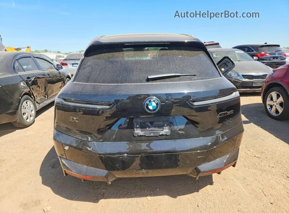 WB533CF02SCS80918 2025 BMW IX Black Вид ззаду