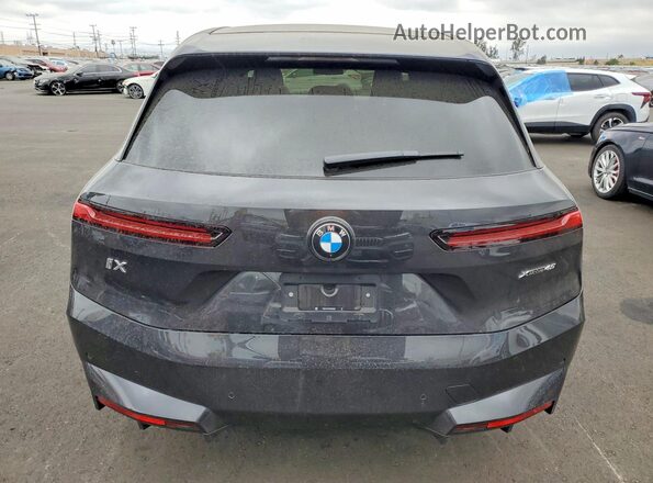 WB543CF06TCW50483 2026 BMW IX Black Вид ззаду