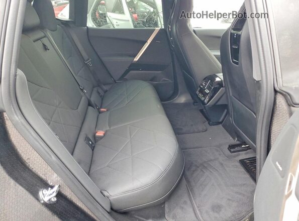 WB543CF06TCW50483 2026 BMW IX Black Вид задньої частини салону