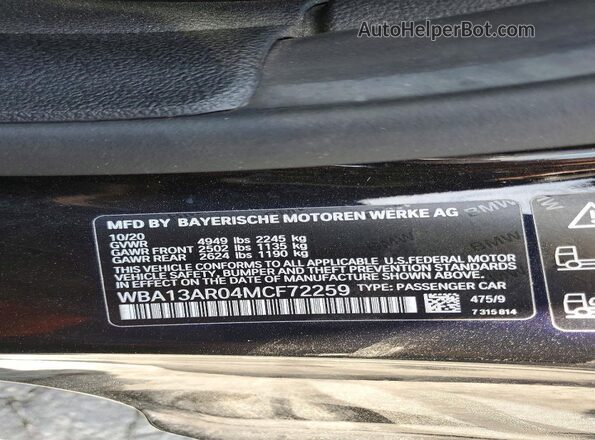 WBA13AR04MCF72259 2021 BMW M4 Black Vista del compartimento del motor