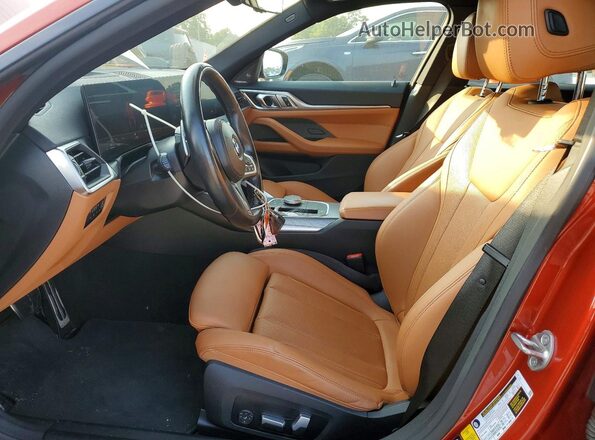 WBA13AW02RFR42762 2024 BMW M4 Orange Вид салону спереду