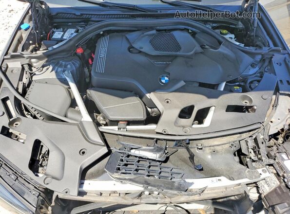 WBA13BJ09NCJ42744 2022 BMW 5 SERIES Gray უკანა სალონის ხედი