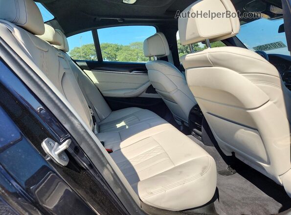 WBA13BK02NCJ30613 2022 BMW M5 Blue Widok tylnych siedzeń