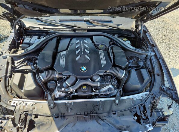 WBA13BK02NCJ30613 2022 BMW M5 Blue Widok wnętrza z tyłu