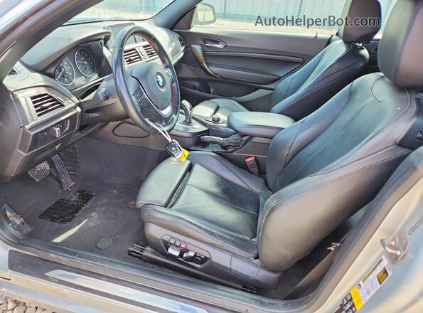 WBA1L9C58GV324461 2016 BMW 2 SERIES Серебряный Вид салона спереди