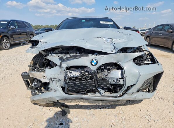 WBA23AT0XPCL29098 2023 BMW 4 SERIES Gray Front view
