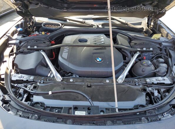 WBA23EH09TCW22033 2026 BMW 7 SERIES Black Вид задньої частини салону