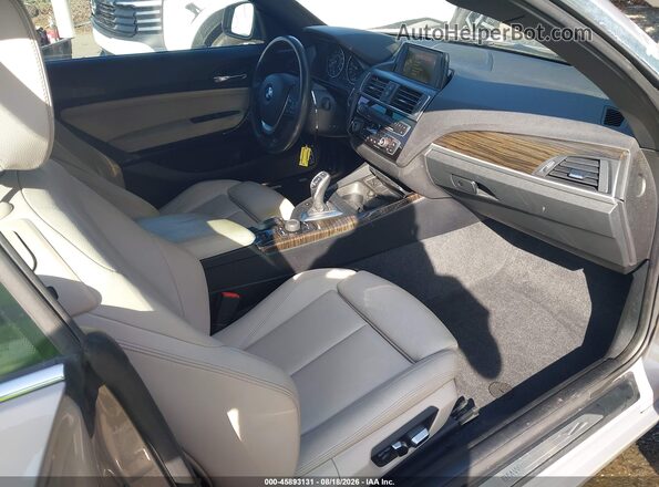 WBA2K9C38HV950356 2017 BMW 2 SERIES Brown Vista interior delantera