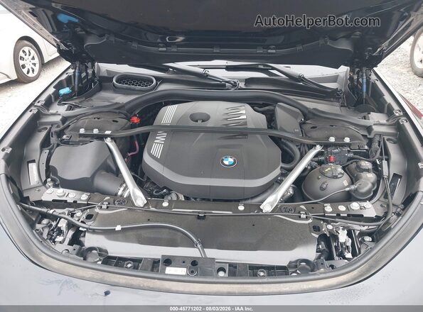 WBA33EH08TCX49909 2026 BMW 7 SERIES Black Rear view