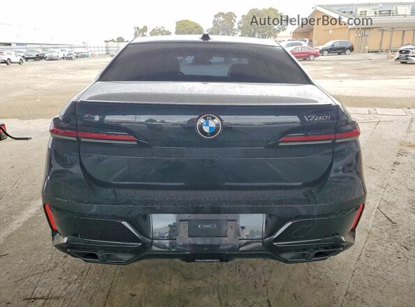 WBA33EJ04RCP67312 2024 BMW 7 SERIES Black Rear view
