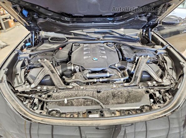 WBA33EJ06RCR52512 2024 BMW 7 SERIES Black უკანა სალონის ხედი
