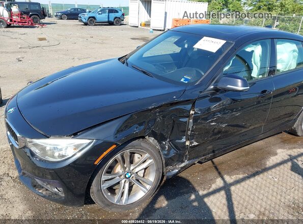 WBA3X9C58GD869725 2016 BMW 3 SERIES Black Widok z przodu