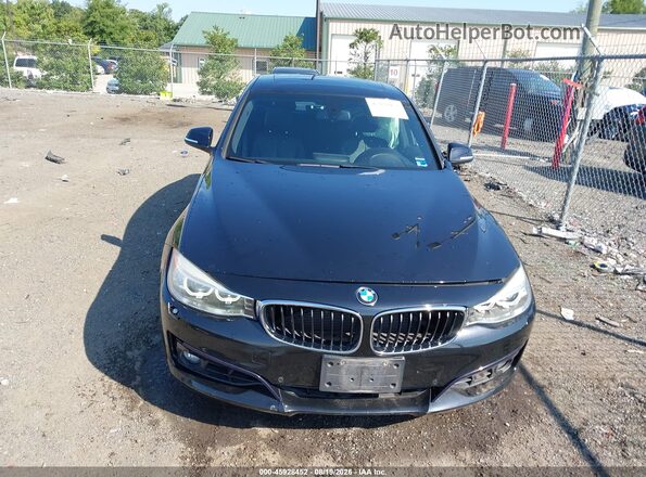 WBA3X9C58GD869725 2016 BMW 3 SERIES Black Widok wnętrza z tyłu