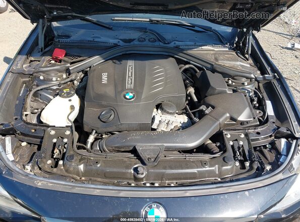 WBA3X9C58GD869725 2016 BMW 3 SERIES Black Widok z tyłu